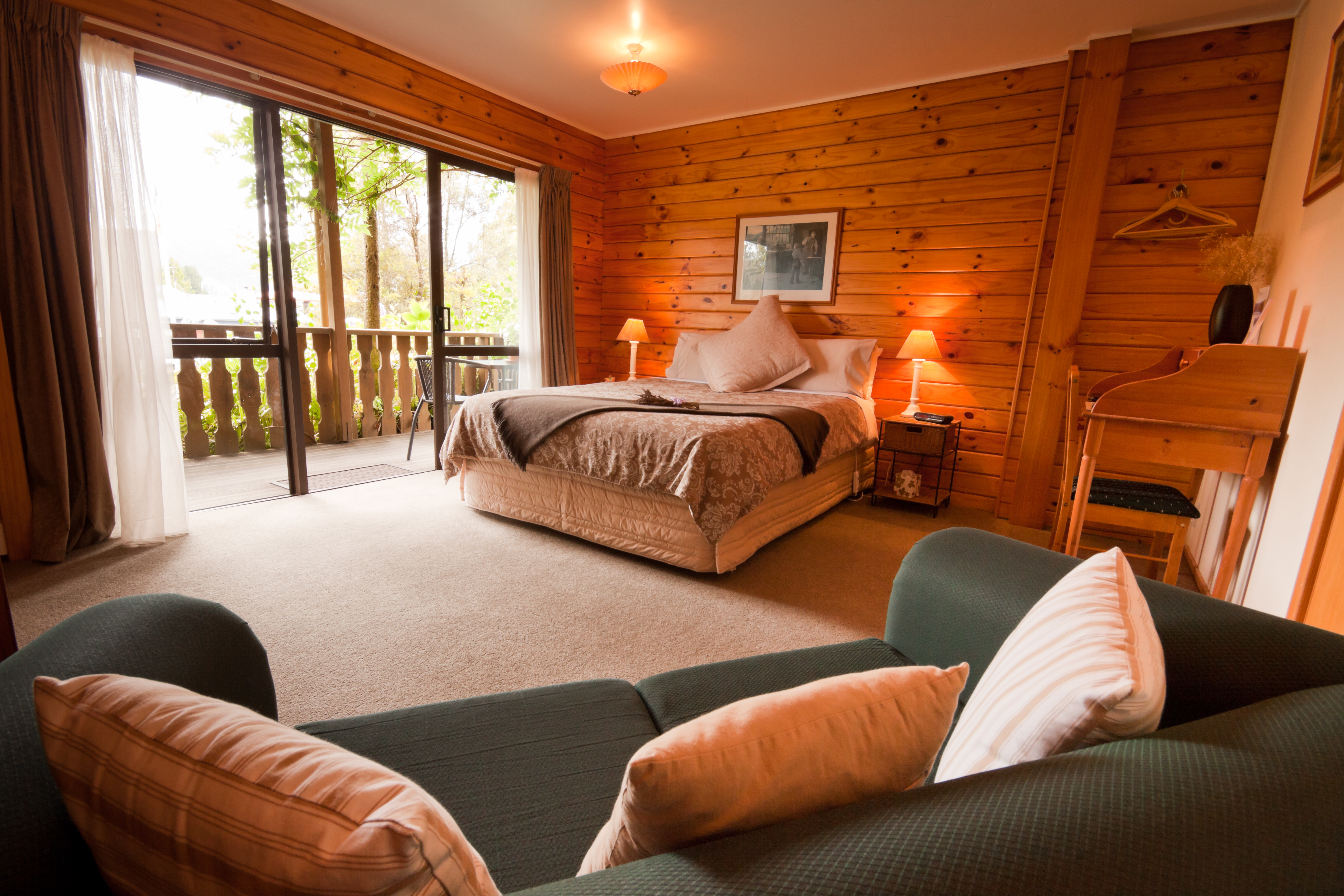 Interior of mountain wooden lodge bedroom
